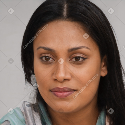 Joyful asian young-adult female with long  brown hair and brown eyes