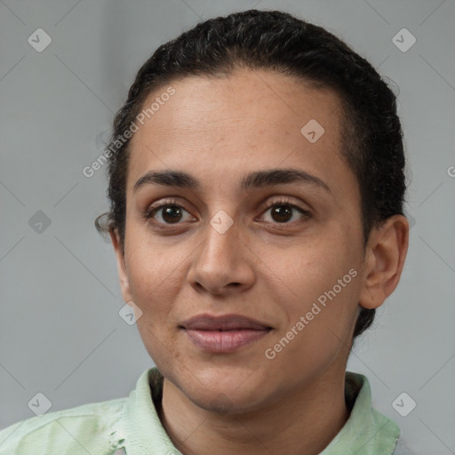 Joyful white young-adult female with short  black hair and brown eyes