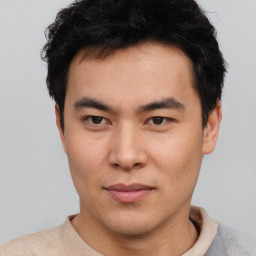 Neutral asian young-adult male with short  brown hair and brown eyes