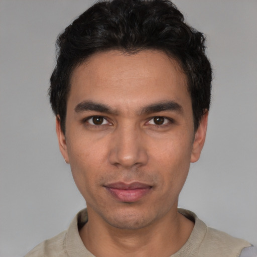 Neutral white young-adult male with short  black hair and brown eyes