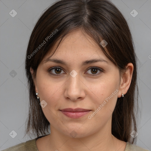 Joyful white young-adult female with medium  brown hair and brown eyes