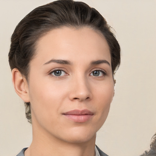 Neutral white young-adult female with short  brown hair and brown eyes