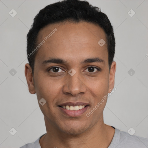 Joyful latino young-adult male with short  black hair and brown eyes