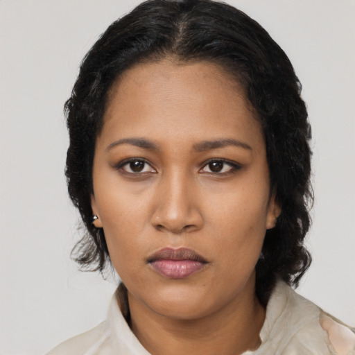 Neutral black young-adult female with long  black hair and brown eyes
