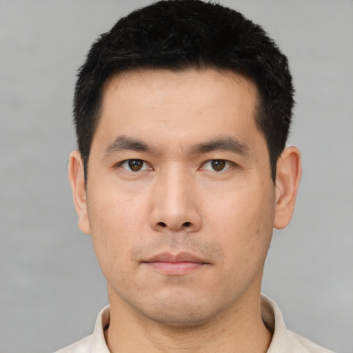 Neutral asian young-adult male with short  black hair and brown eyes