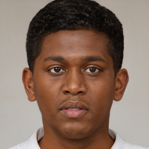 Neutral black young-adult male with short  brown hair and brown eyes