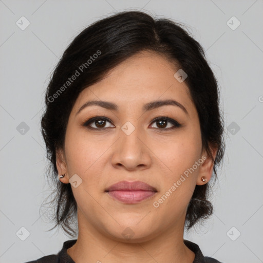 Joyful latino young-adult female with medium  brown hair and brown eyes