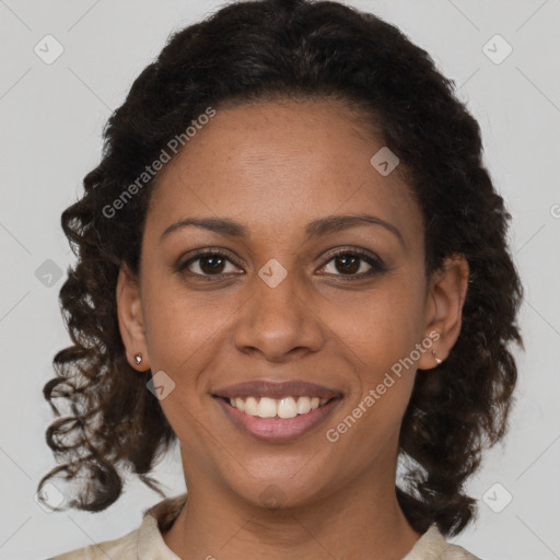 Joyful black young-adult female with medium  brown hair and brown eyes