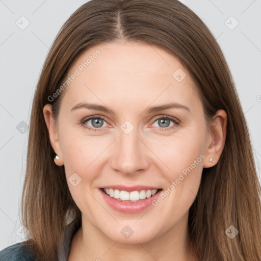 Joyful white young-adult female with long  brown hair and grey eyes