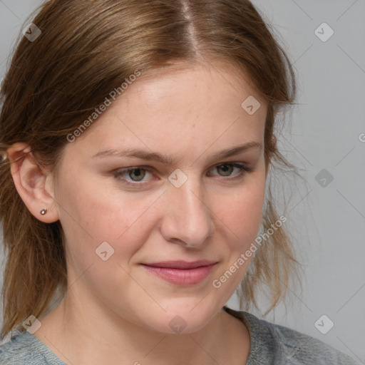 Joyful white young-adult female with medium  brown hair and blue eyes