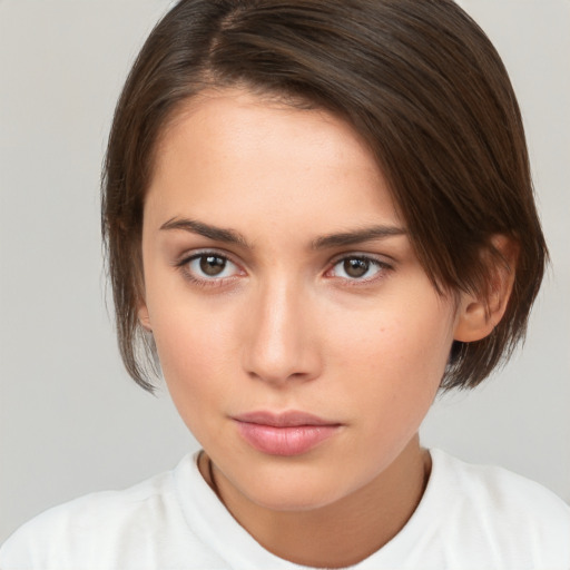 Neutral white young-adult female with medium  brown hair and brown eyes