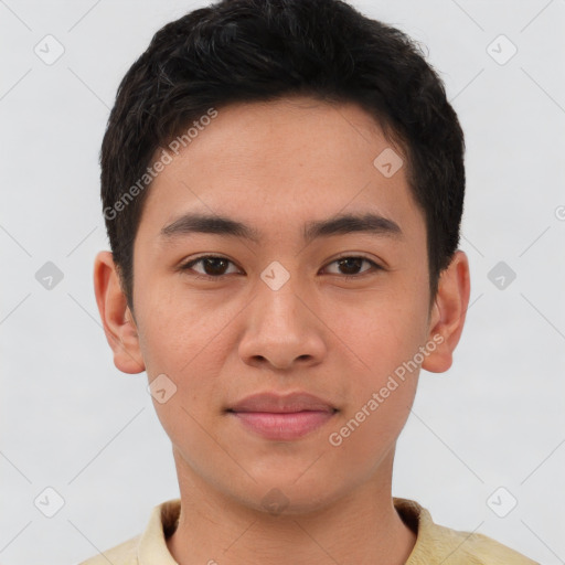 Joyful asian young-adult male with short  brown hair and brown eyes