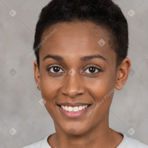 Joyful black young-adult female with short  brown hair and brown eyes