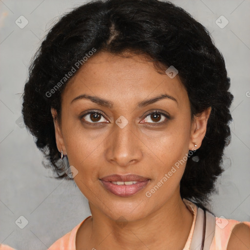 Joyful black young-adult female with medium  brown hair and brown eyes