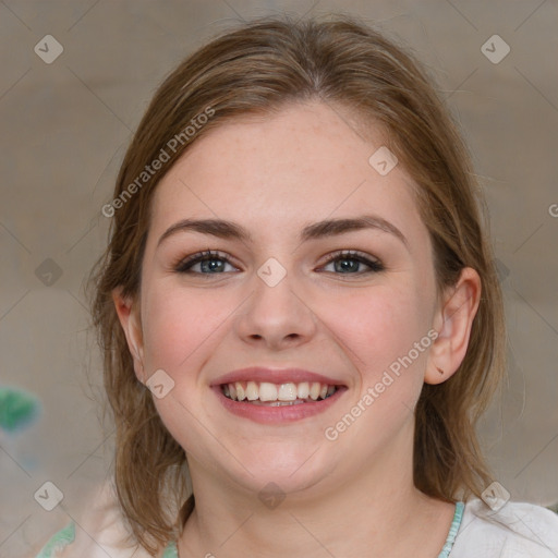 Joyful white young-adult female with medium  brown hair and blue eyes