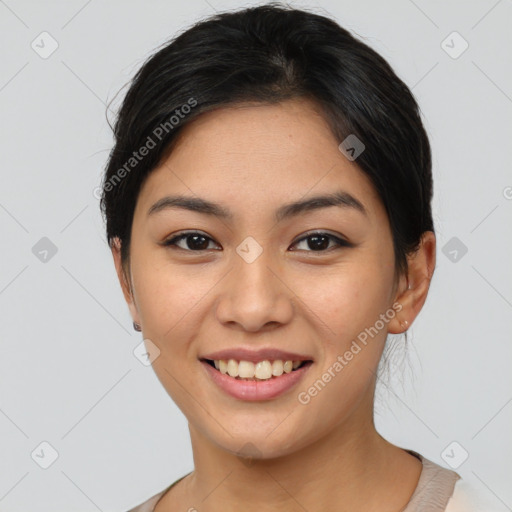 Joyful asian young-adult female with short  brown hair and brown eyes