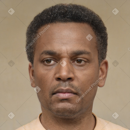 Neutral latino young-adult male with short  brown hair and brown eyes