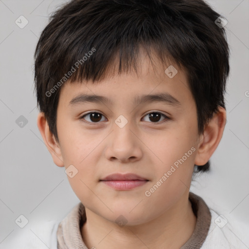 Joyful white child male with short  brown hair and brown eyes