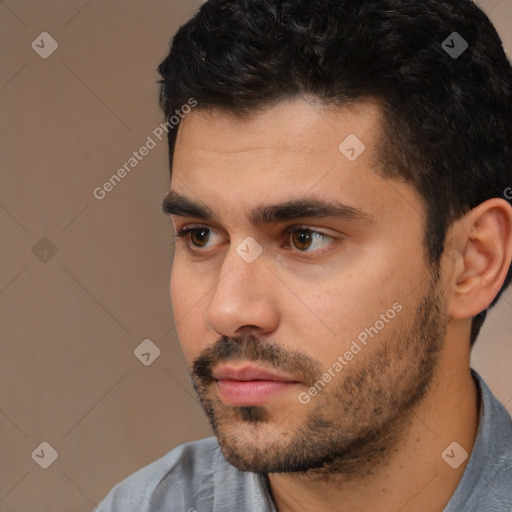 Neutral white young-adult male with short  black hair and brown eyes