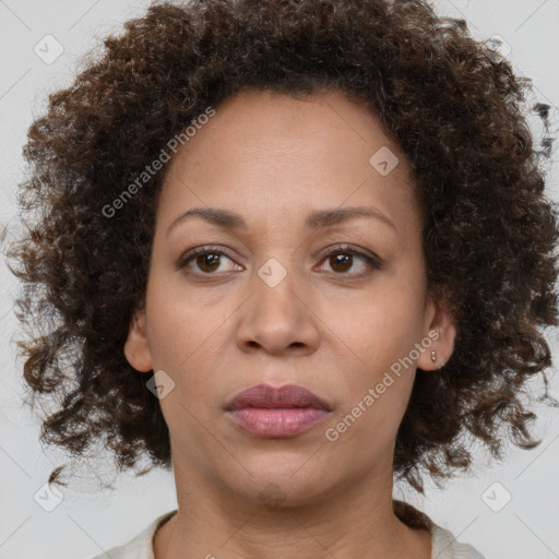 Neutral black adult female with medium  brown hair and brown eyes