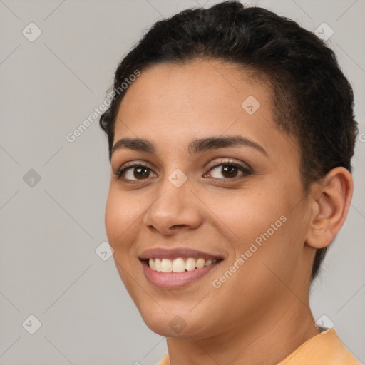 Joyful white young-adult female with short  brown hair and brown eyes