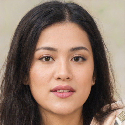 Joyful asian young-adult female with long  brown hair and brown eyes