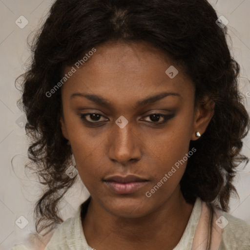 Neutral black young-adult female with medium  brown hair and brown eyes