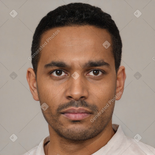 Neutral latino young-adult male with short  black hair and brown eyes