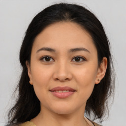 Joyful asian young-adult female with medium  brown hair and brown eyes