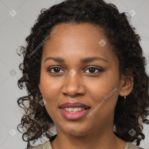 Joyful black young-adult female with medium  brown hair and brown eyes