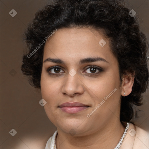 Joyful latino young-adult female with long  brown hair and brown eyes