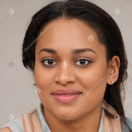 Joyful latino young-adult female with medium  brown hair and brown eyes