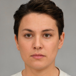 Neutral white young-adult female with short  brown hair and brown eyes