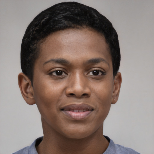 Joyful black young-adult female with short  black hair and brown eyes