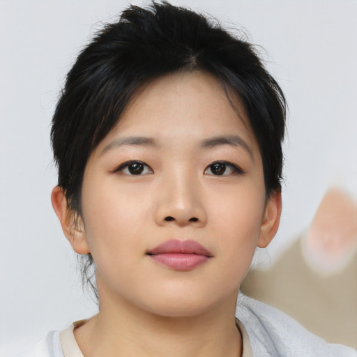 Neutral asian young-adult female with short  brown hair and brown eyes