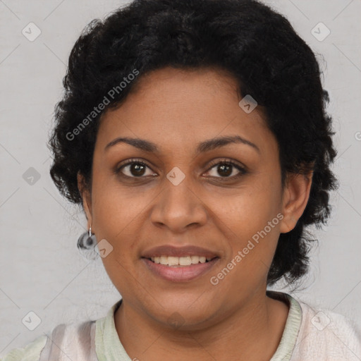 Joyful black adult female with short  brown hair and brown eyes