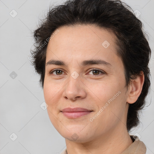 Joyful white adult female with short  brown hair and brown eyes