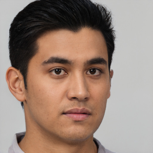 Neutral latino young-adult male with short  brown hair and brown eyes
