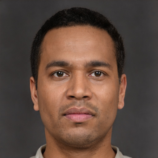Neutral latino young-adult male with short  brown hair and brown eyes