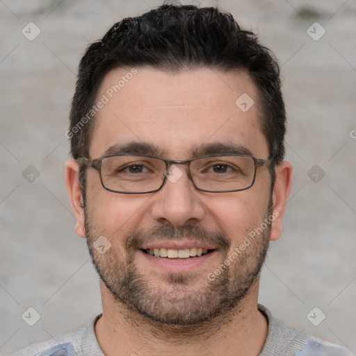 Joyful white young-adult male with short  black hair and brown eyes