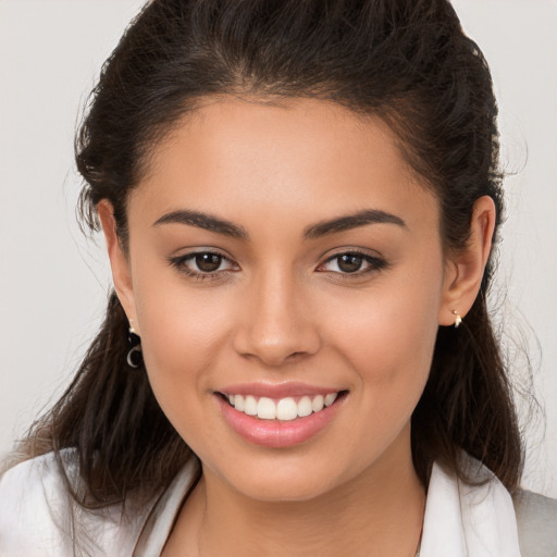 Joyful white young-adult female with medium  brown hair and brown eyes