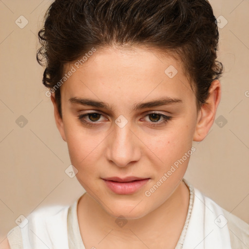 Joyful white child female with short  brown hair and brown eyes