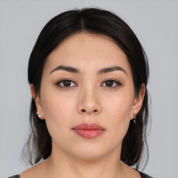 Neutral asian young-adult female with medium  brown hair and brown eyes