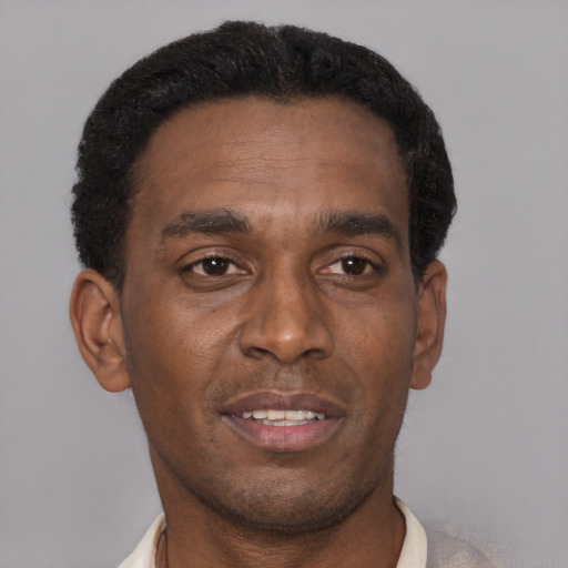 Neutral black adult male with short  brown hair and brown eyes