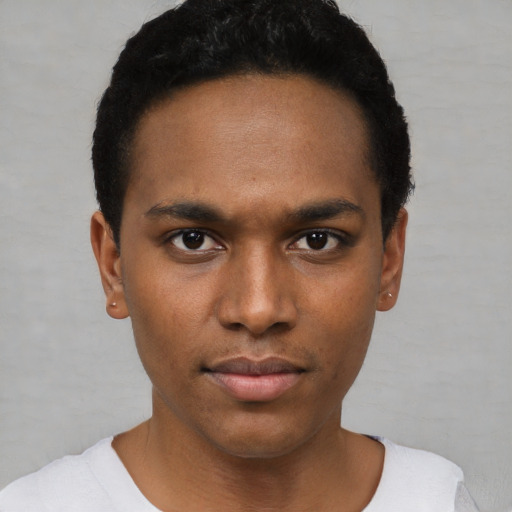 Neutral black young-adult male with short  black hair and brown eyes