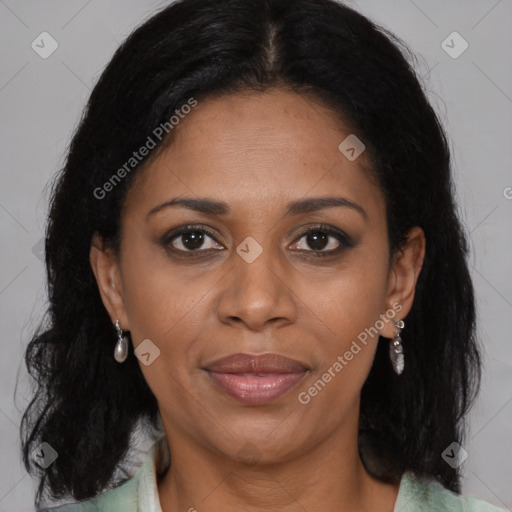 Joyful black adult female with medium  brown hair and brown eyes