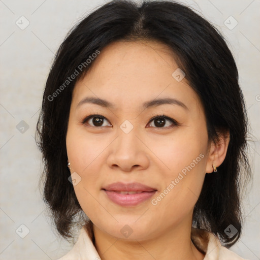 Joyful asian young-adult female with medium  brown hair and brown eyes