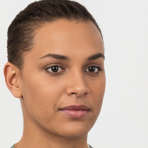 Joyful latino young-adult female with short  brown hair and brown eyes