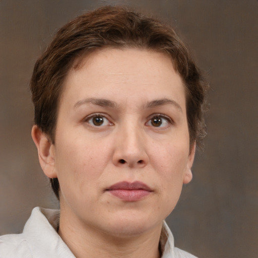 Neutral white adult female with short  brown hair and brown eyes