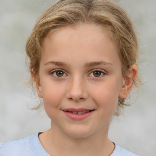 Joyful white child female with medium  brown hair and brown eyes